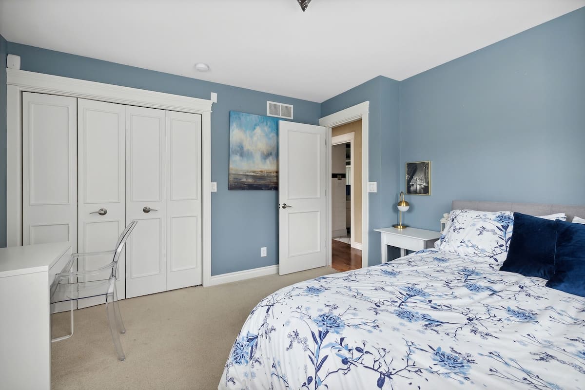 Bedroom 2 is on the main level & has a queen-size bed.