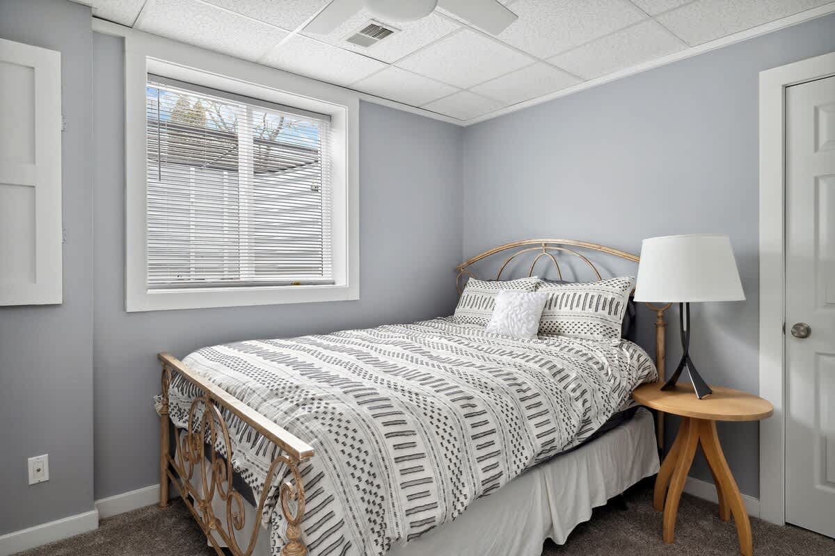 Bedroom 6 is on the lower level & has a queen-size bed.