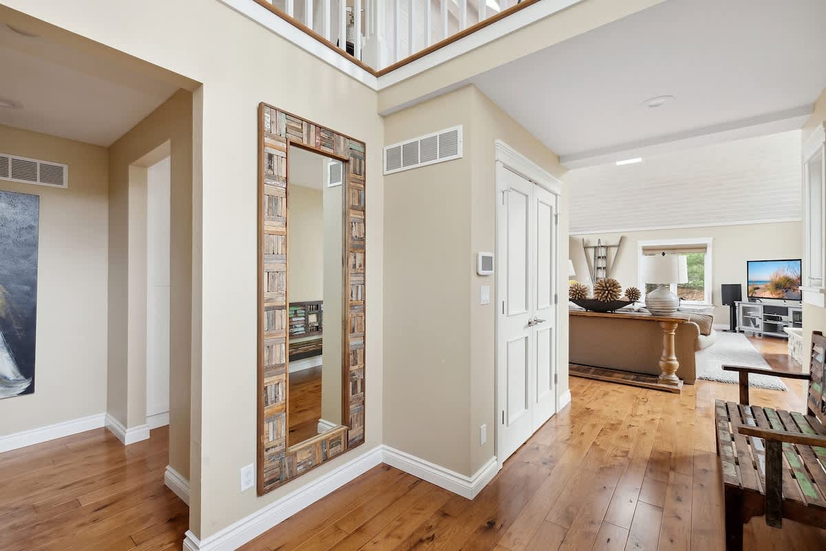 Step into the inviting living room, where modern elegance meets cozy comfort.