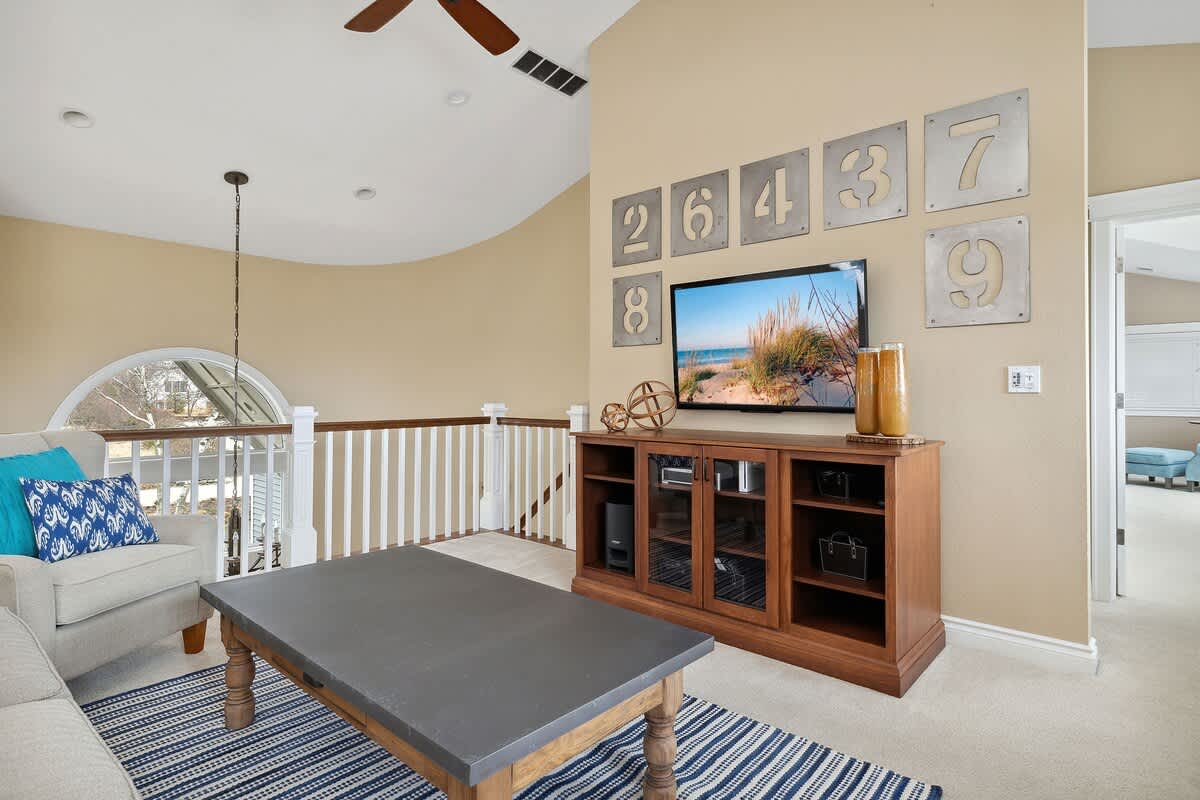 Sink into the plush sofa and enjoy your favorite movie or TV show