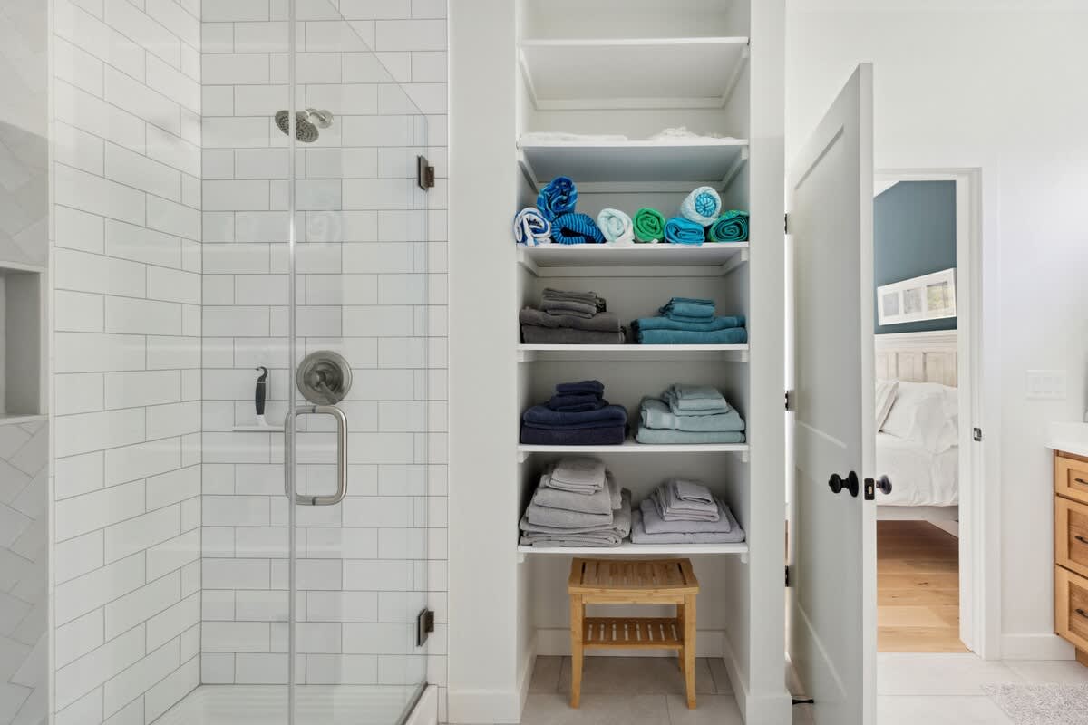 Comfort and elegance meet to create the ultimate retreat in the primary bathroom