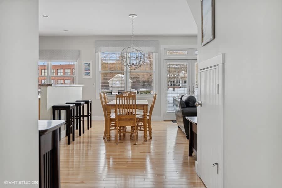 Explore a stylish and functional space with storage and cozy dining.