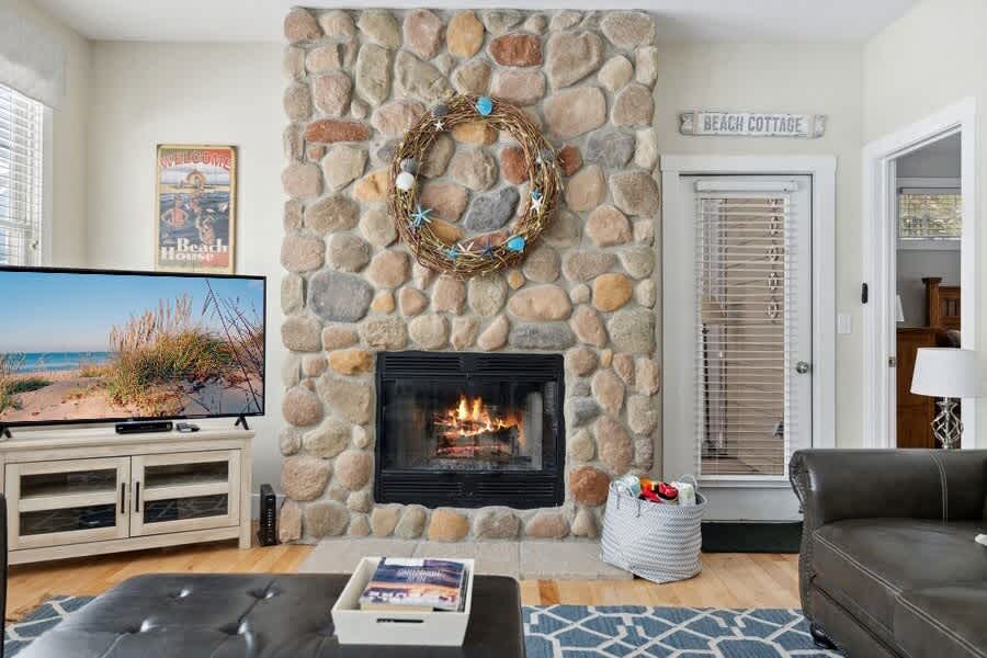 Relax by the cozy fireplace and catch up on your favorite shows or books.