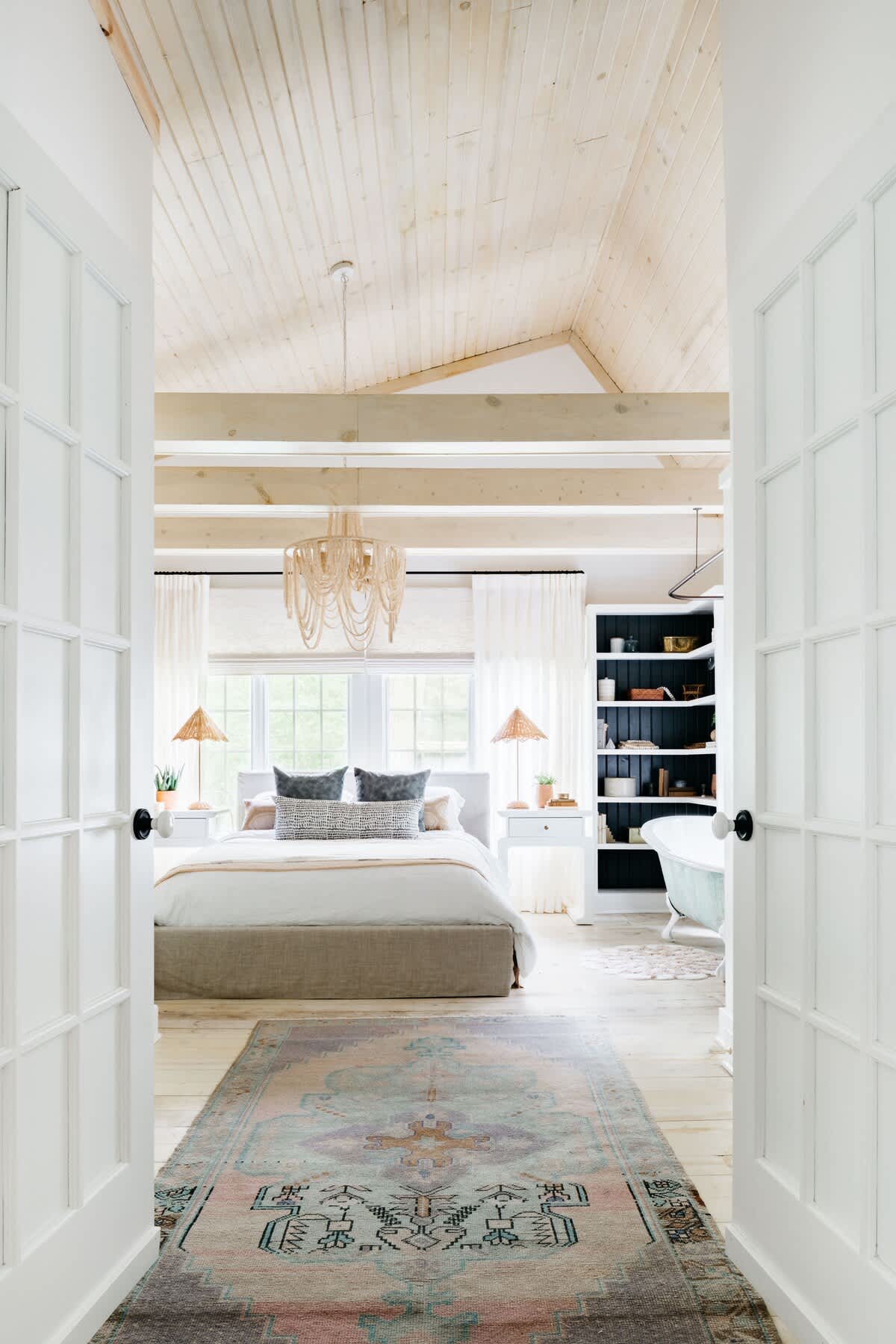 Leo Cottage's main bedroom has a luxurious queen-size bed.