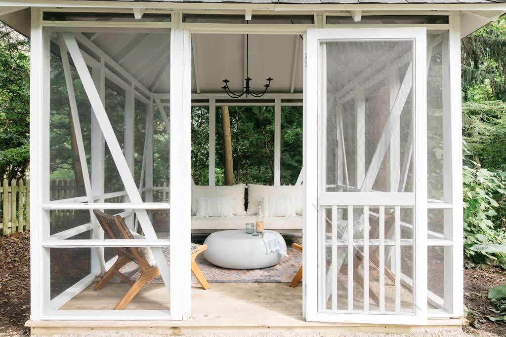 Our well-appointed screened-in gazebo keeps the bugs away.