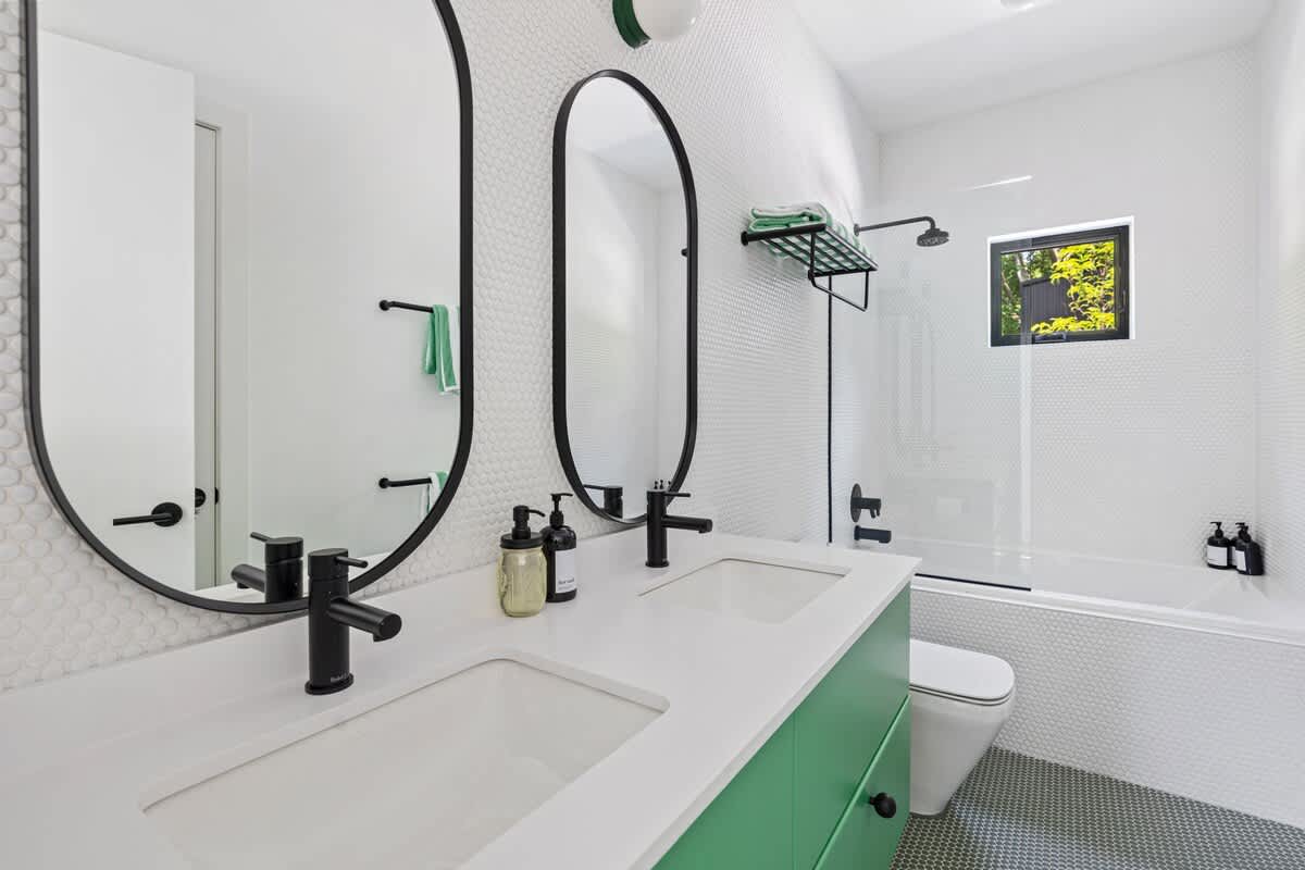 Custom fixtures and tilework add an exquisite flair to all 4 bathrooms.