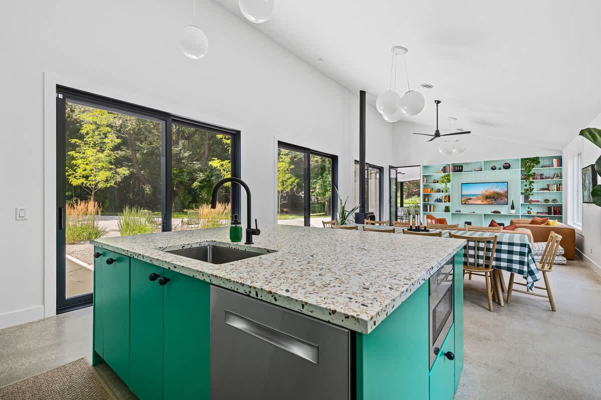 Seamlessly serve meals and clean up with open access to the dining area.