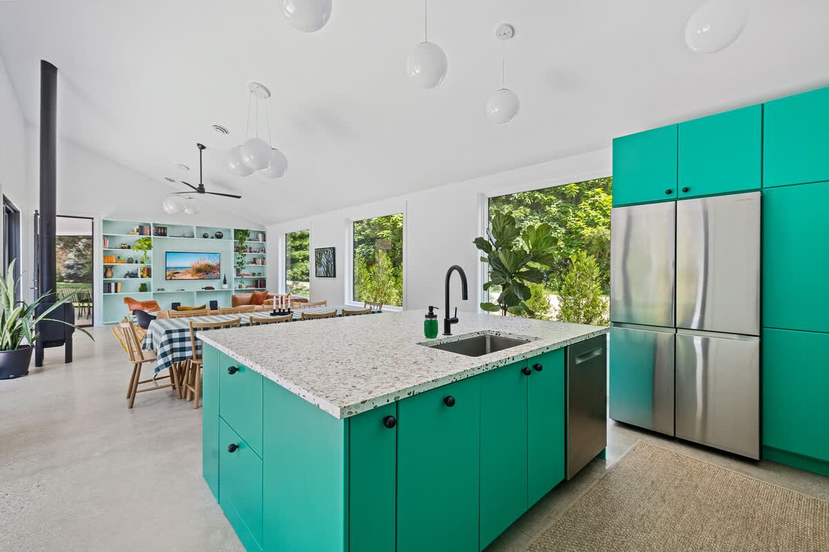 An open kitchen design allows for seamless conversation and connection.