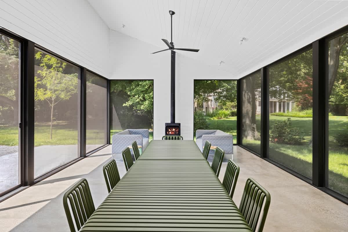 The porch is ready to host memorable gatherings and delightful conversations.