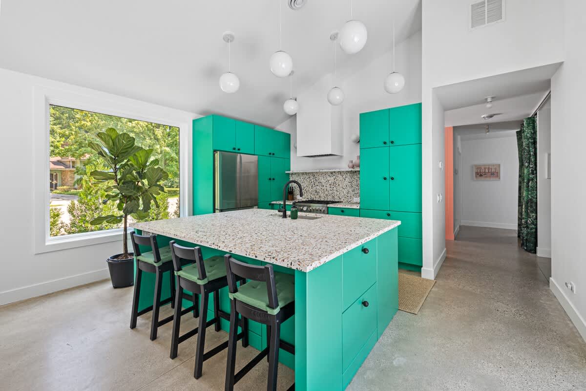 Pull up a stool and enjoy a casual meal or quick snack at the kitchen island.