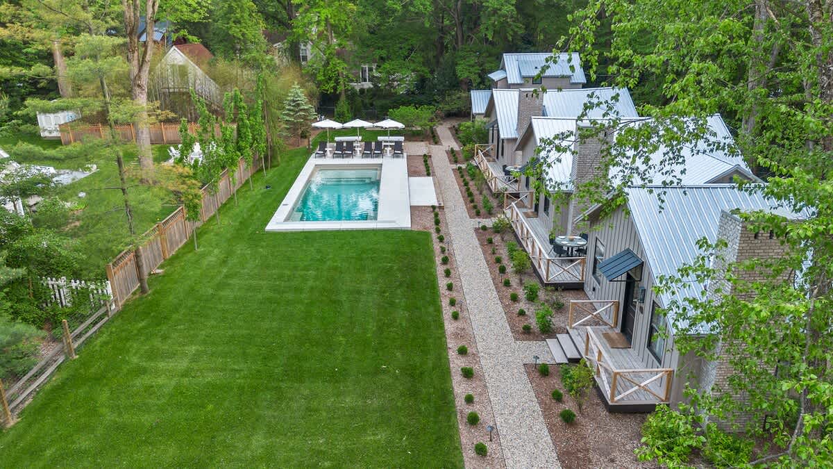 Loving the peaceful vibes of the backyard oasis - pool, sun, and greenery as far as the eye can see!