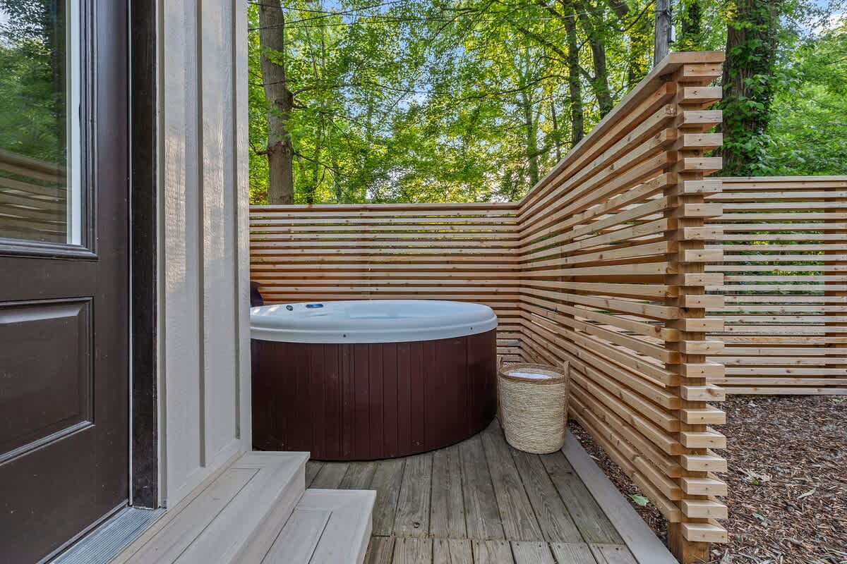 Relaxing in the hot tub on the deck, enjoying the view