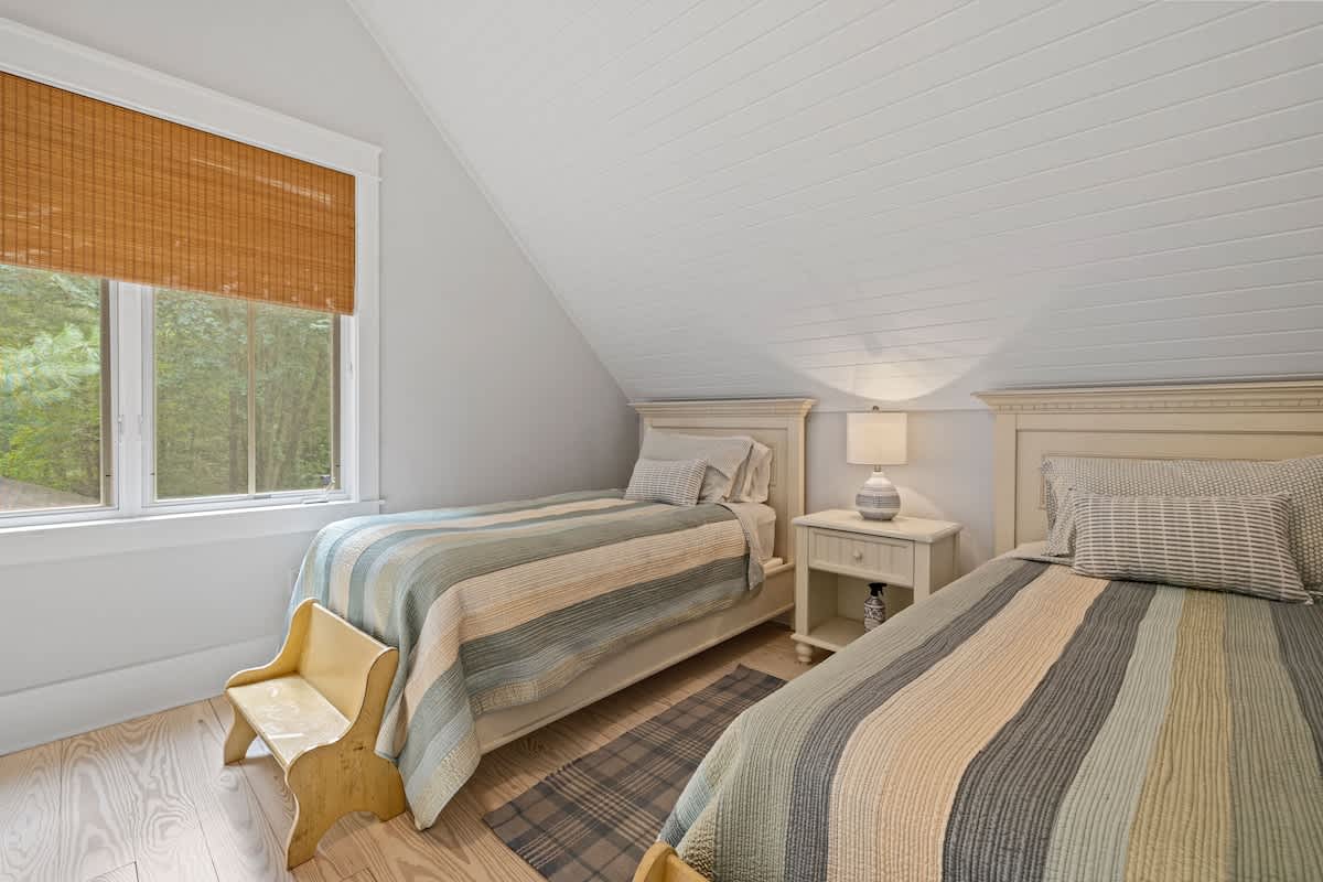Two twin beds side by side to share bedtime stories.