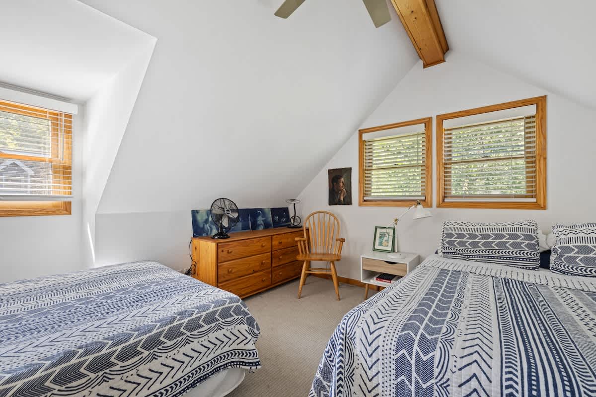 Bedroom 4 is on the upper level & has a queen and a double-size beds.