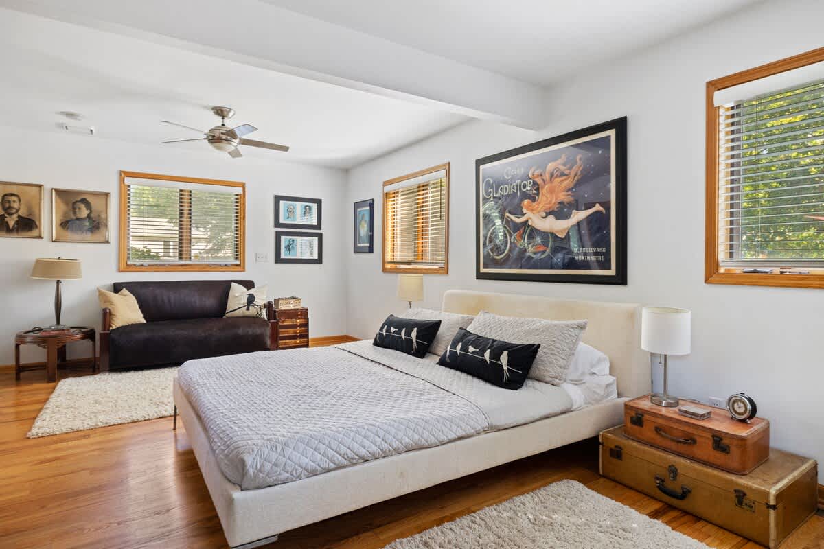 Primary bedroom is on the main level & has a king-size bed.