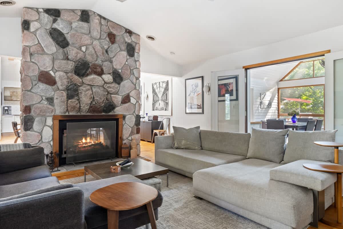 Stretch and relax on our cozy sectional next to the fire.