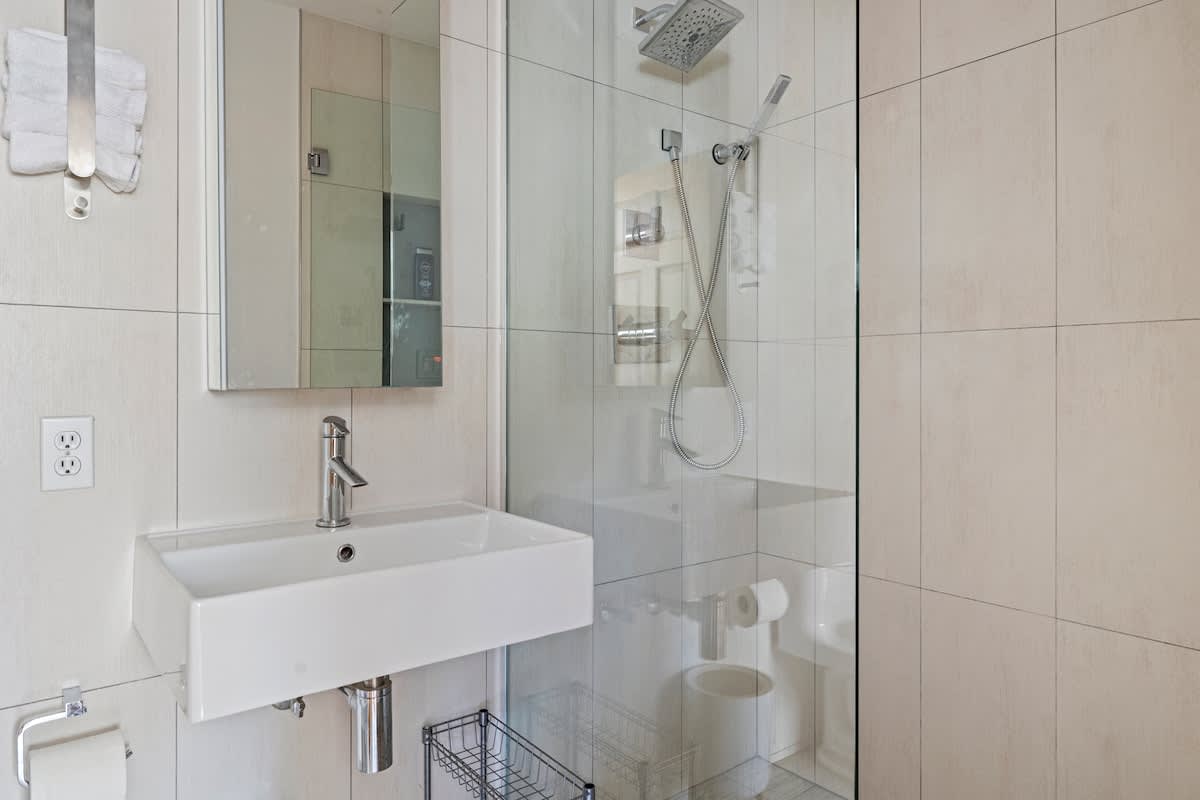 Sleek and sophisticated, the main ensuite bath is a true retreat.
