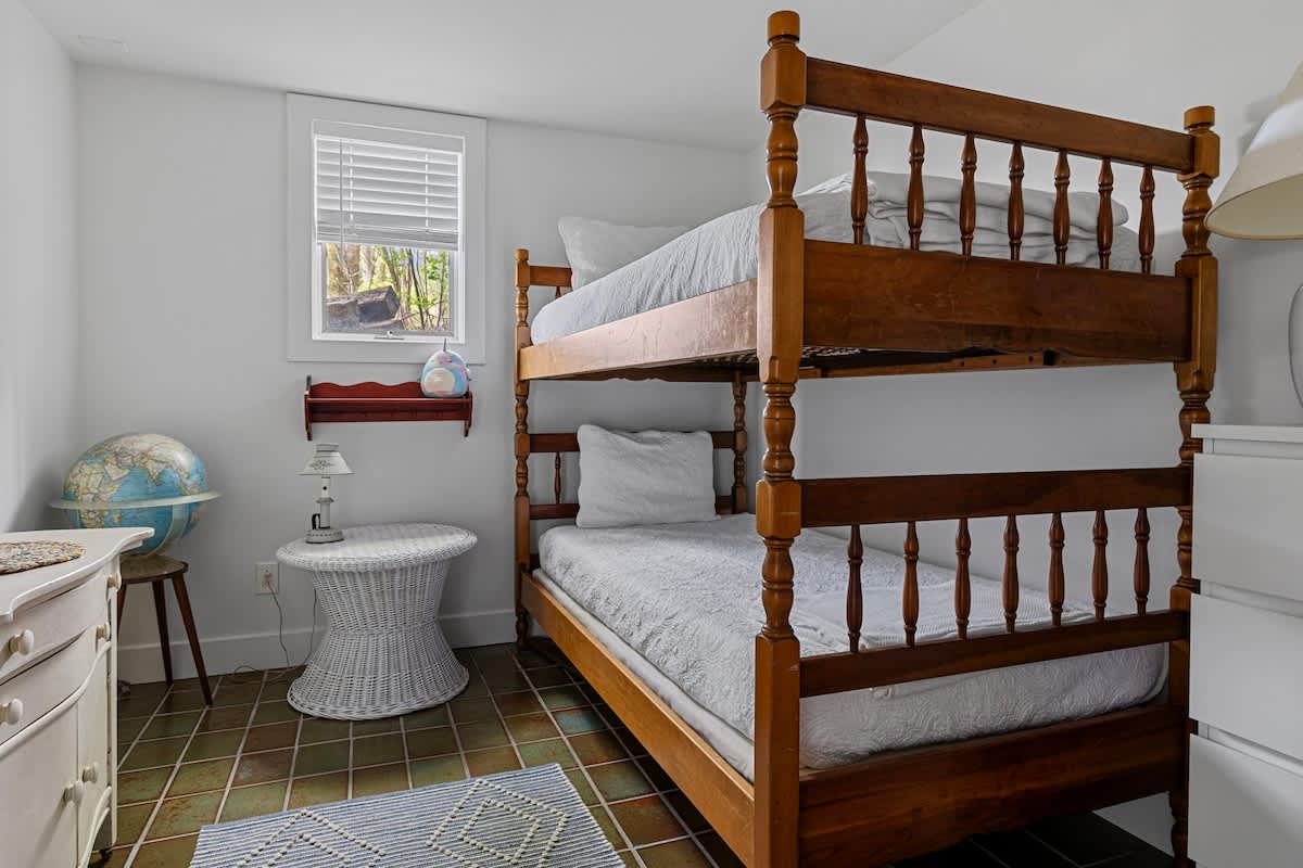 Bedroom 4 is on the main level & has a twin-size bunkbed.