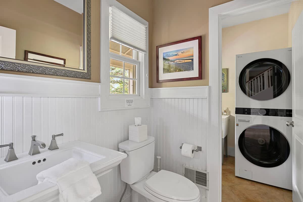 Off of the downstairs bathroom is a laundry room with a high-end washer and dryer.