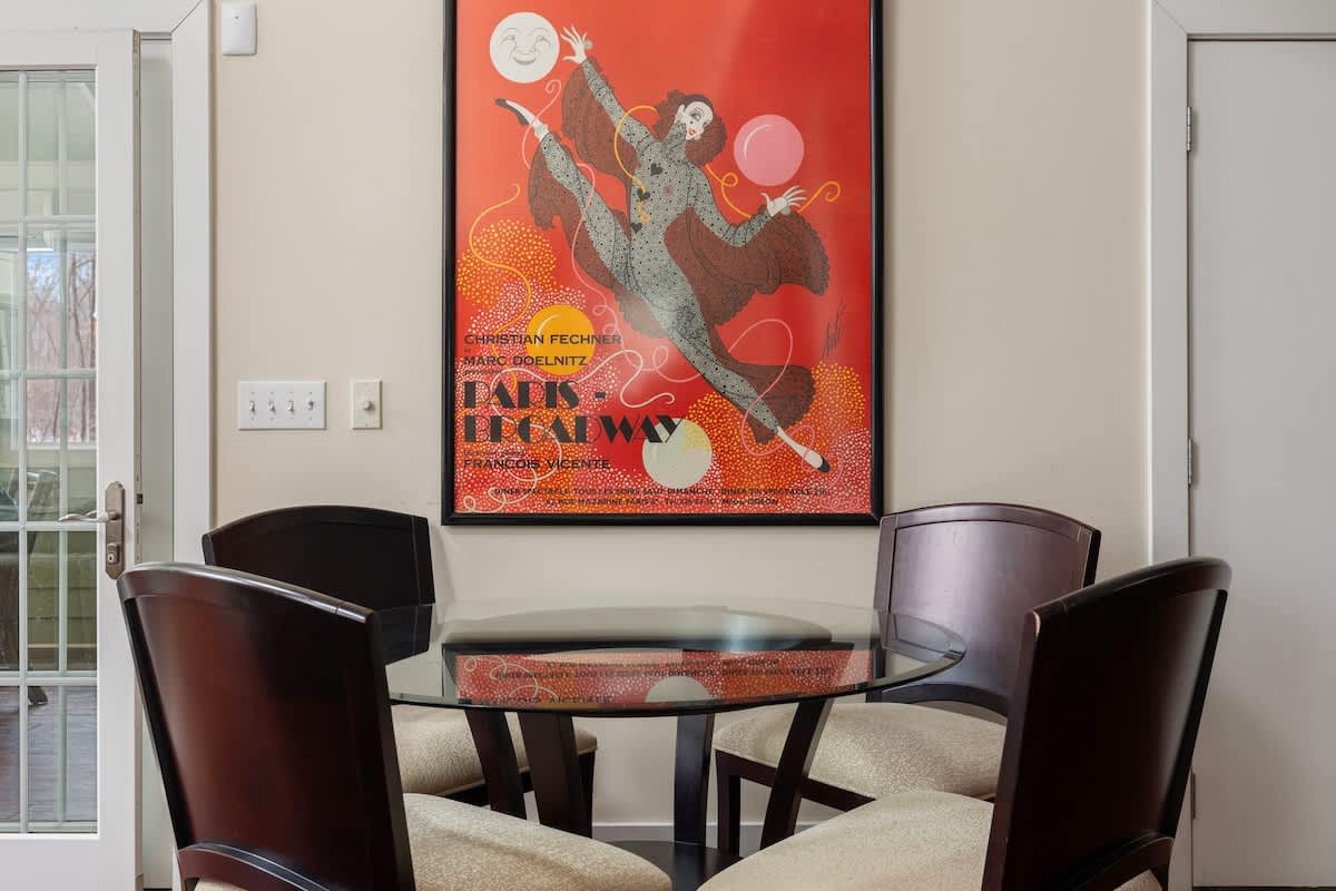 Just off the kitchen in the Great Room is a cute 4-seater breakfast nook table.
