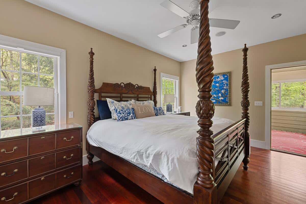 The primary bedroom is on the main level & has a king-size bed.