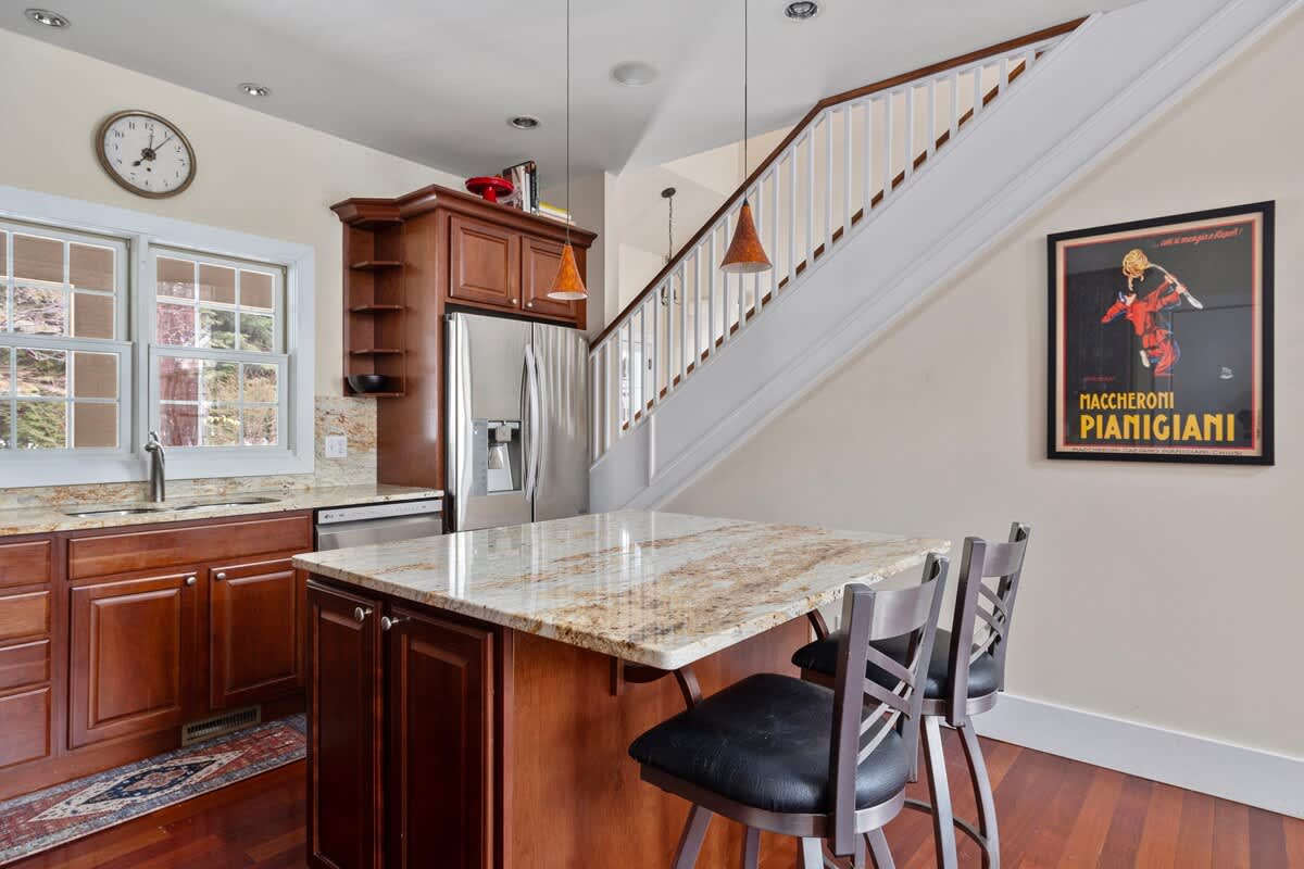 Want a snack or cup of morning coffee? Gather round the kitchen island, y'all!