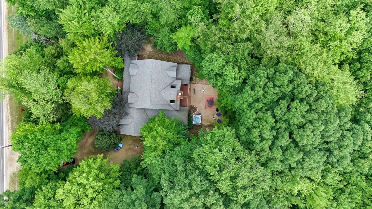 Bird’s-eye view of your private woodland escape—peace in every direction.