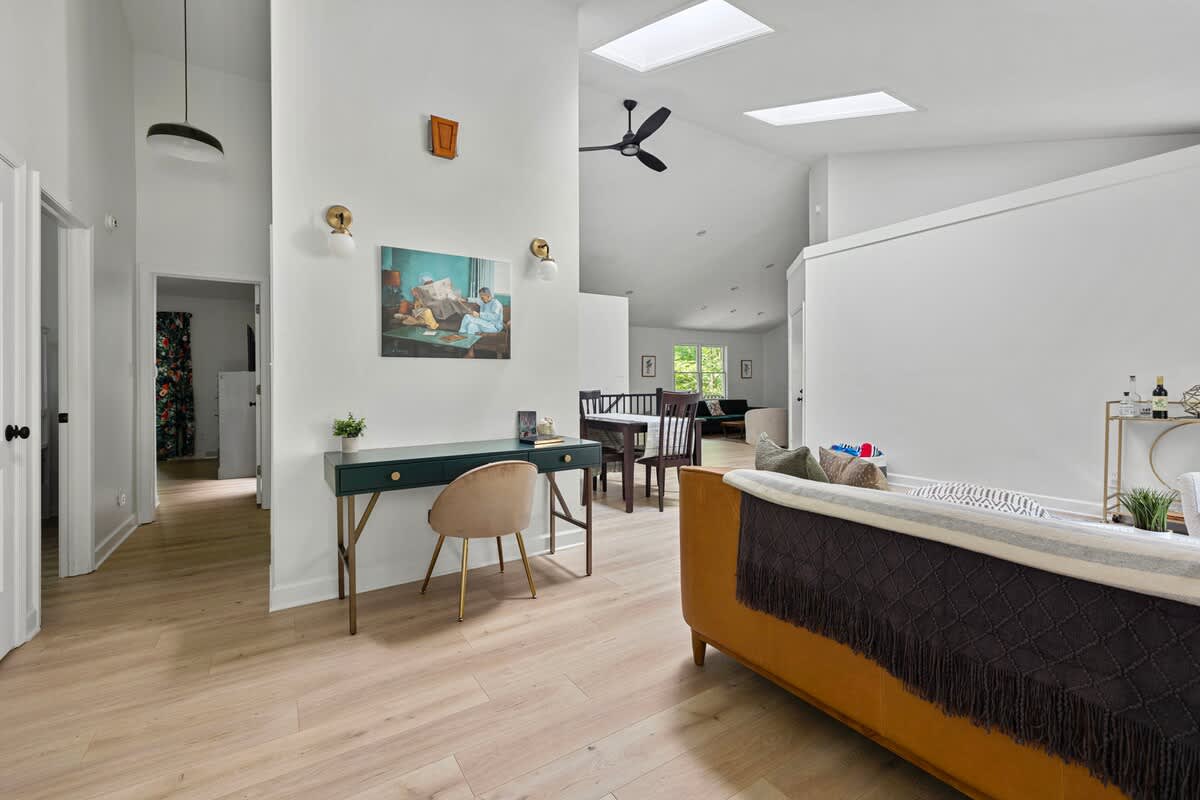 The open design and vaulted ceilings highlight this chic and comfortable home.