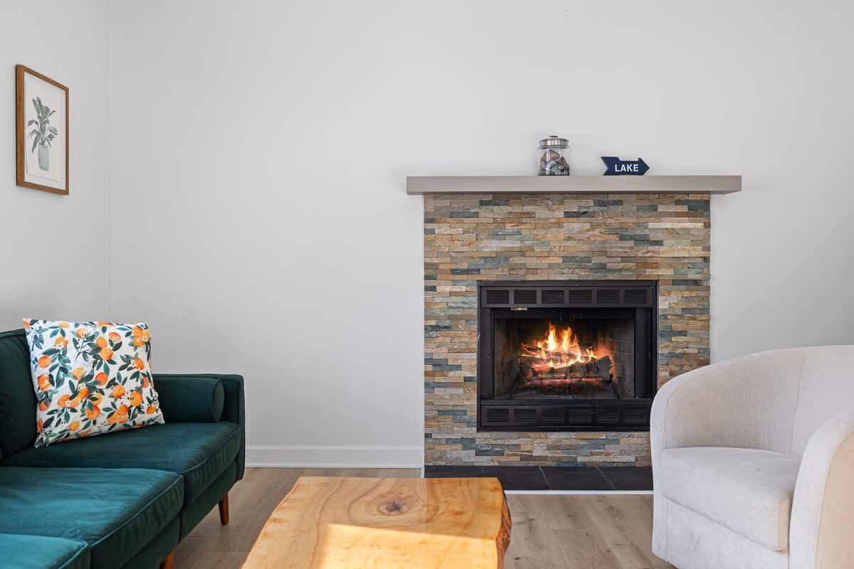 Gathering around a roaring fireplace at night with family or friends - Priceless