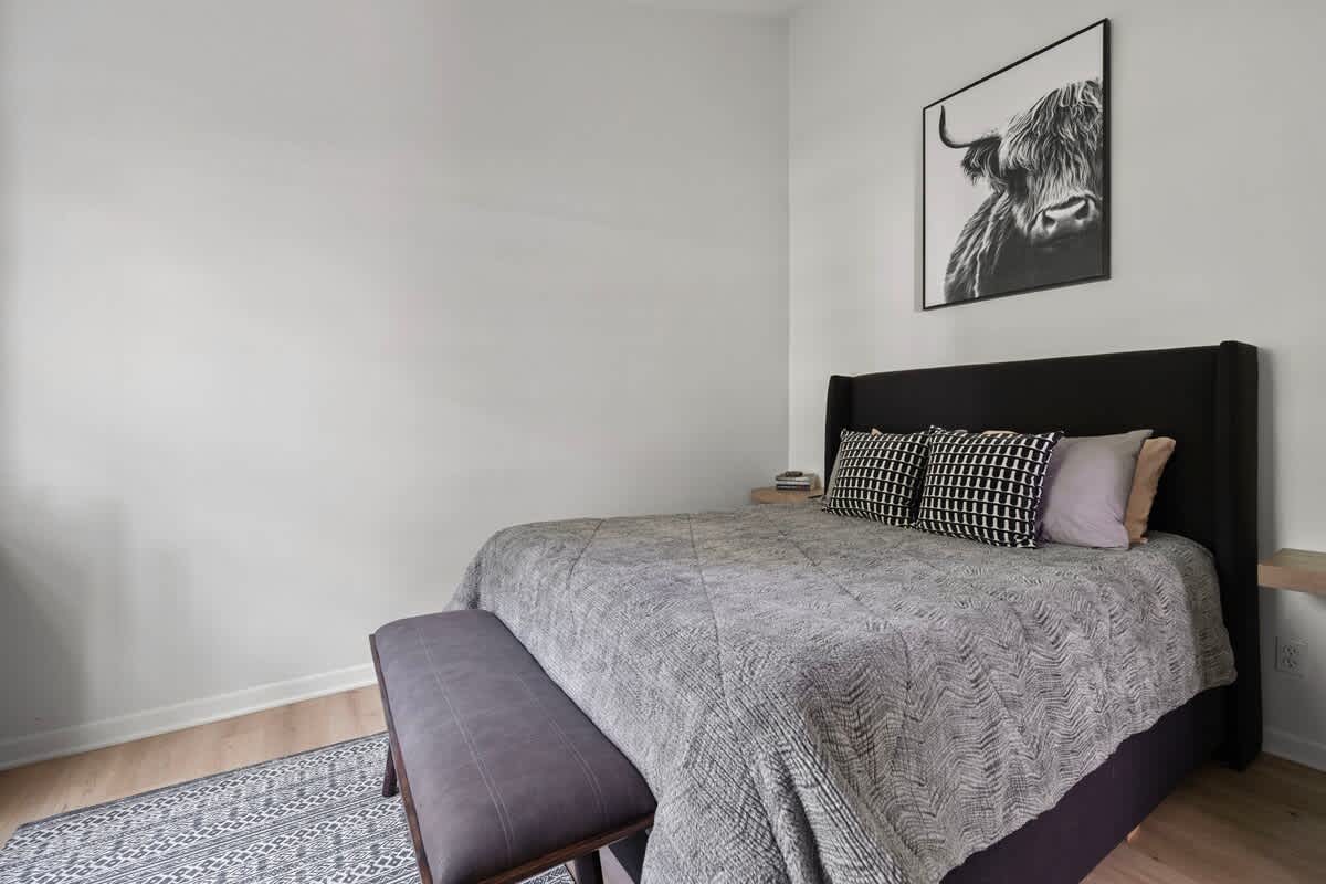 Bedroom 2 has a queen-size bed.