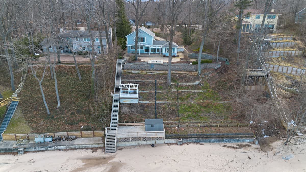 You can walk down steps to enjoy 2 relaxing decks between the house and beach.