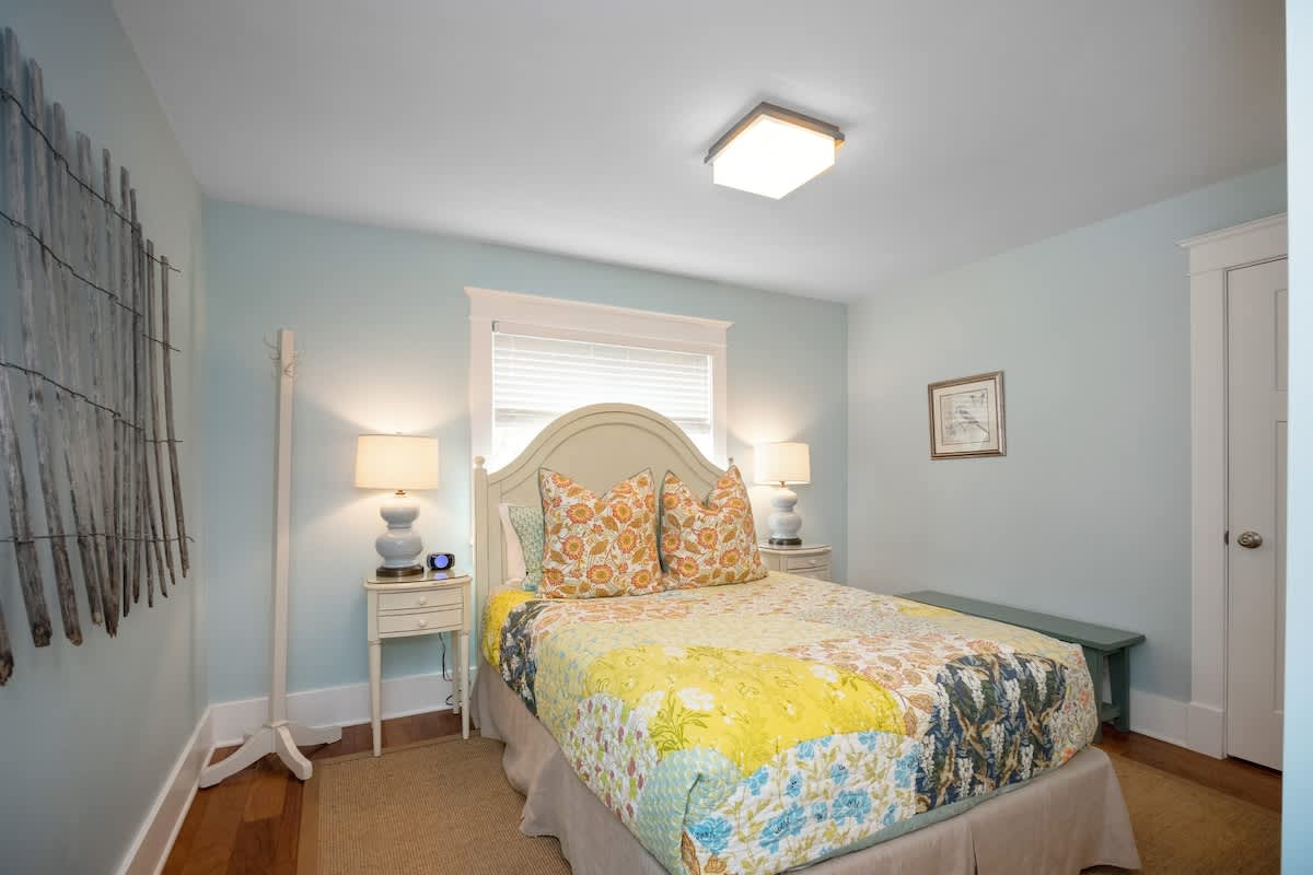 Bedroom 3 is on the main level & has a queen-size bed.