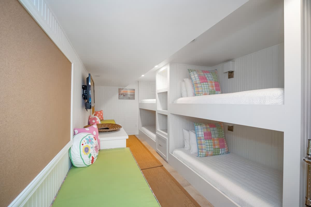 Bedroom 5 is on the lower level & has a 2 twin-size bunkbeds.