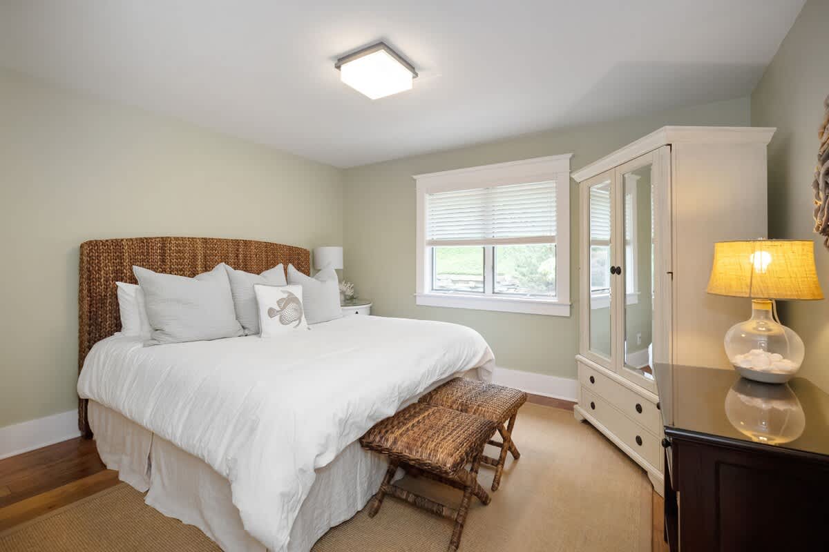 Bedroom 4 is on the main level & has a king-size bed.