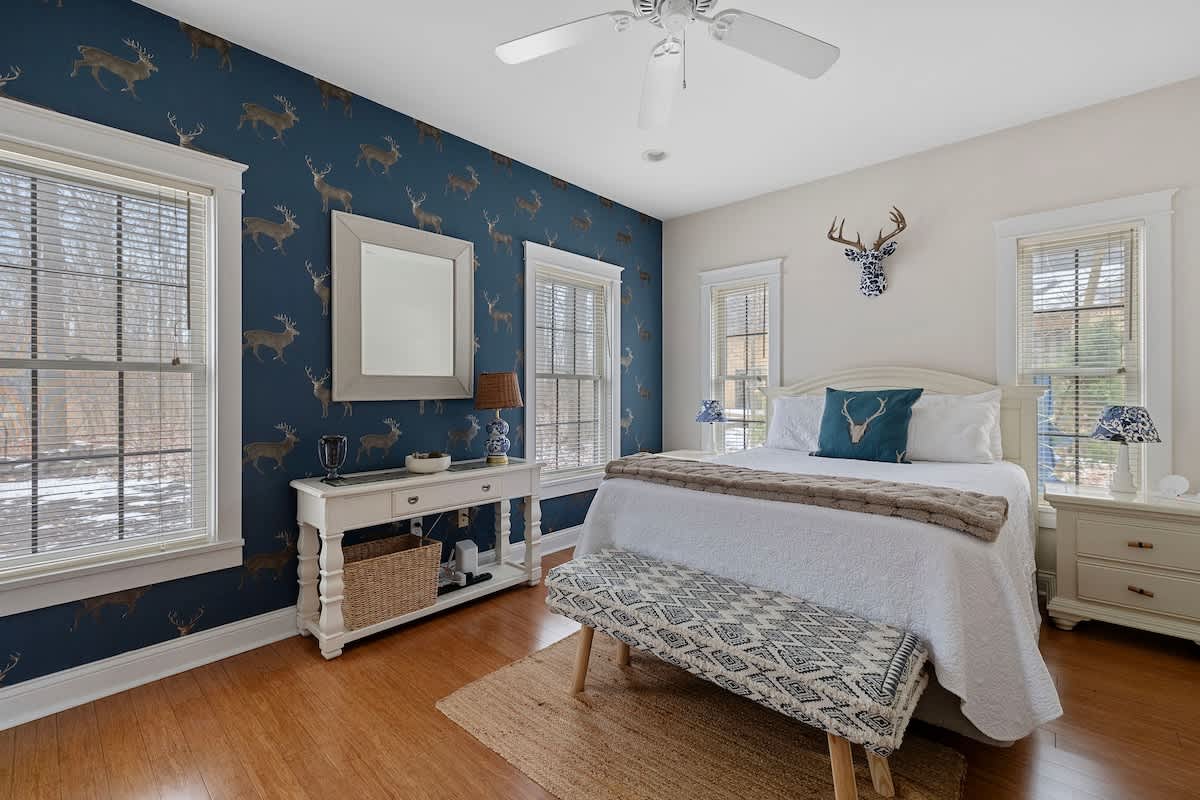 Primary bedroom is on the main level & has a queen-size bed.