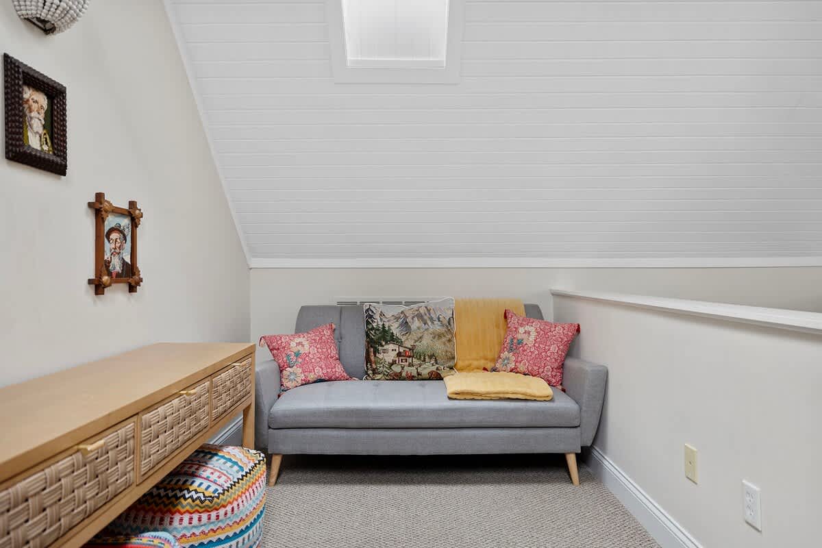 Sweet spots abound upstairs for daydreaming or chatting with family or friends.