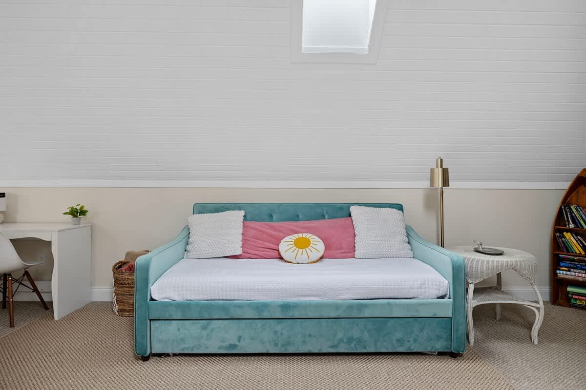 That very same upstairs family room couch turns into a sleeper sofa. Voila!