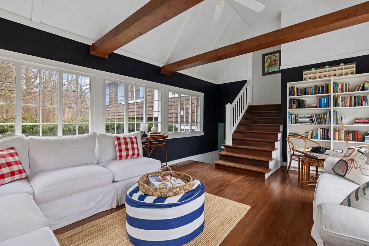 Comfy to the max. Great views, wall full of good books, a game table. Boom.