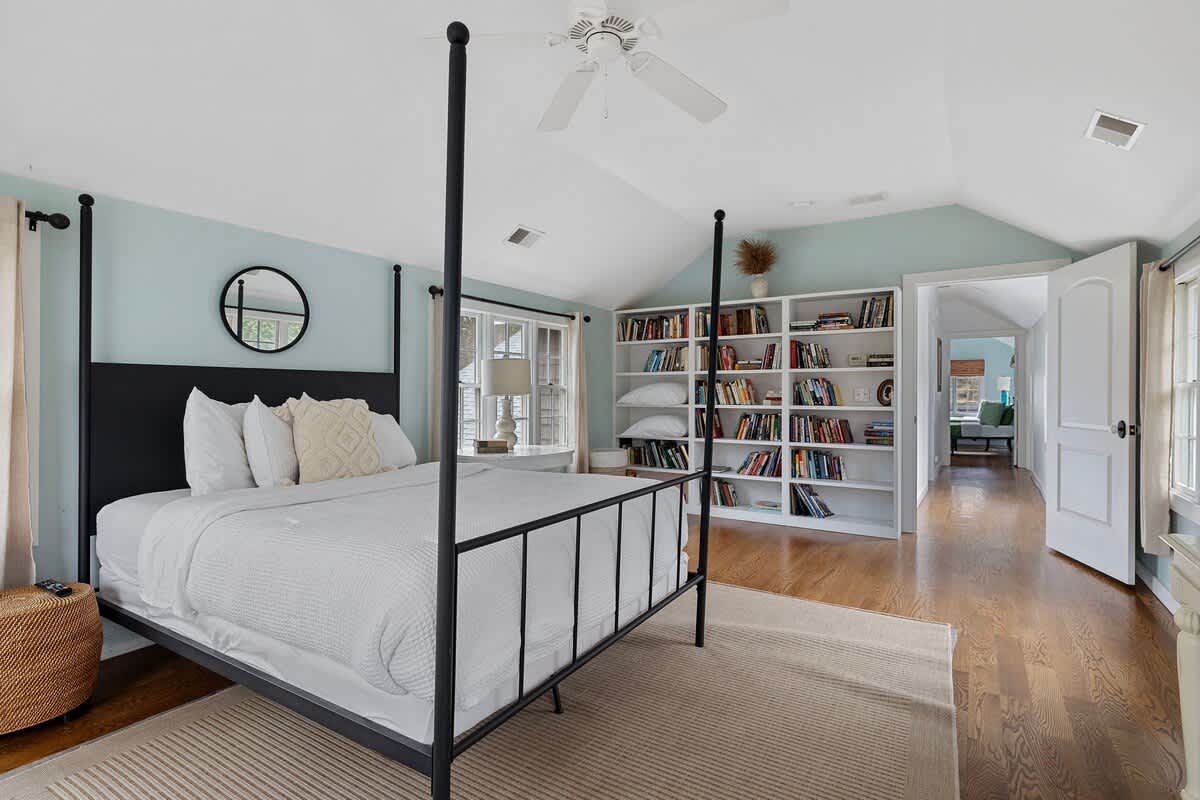 Primary bedroom is on the upper level and has a queen-size bed.