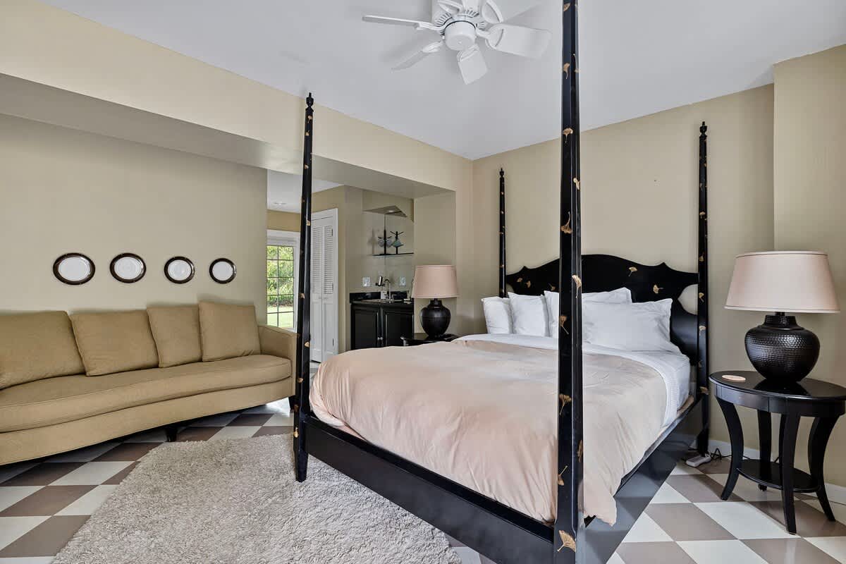 Suite 1 has a queen-size bed.