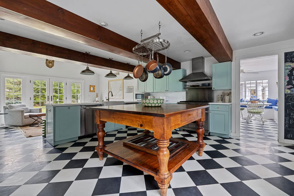 The open design kitchen allows your guests to choose eating and seating options.