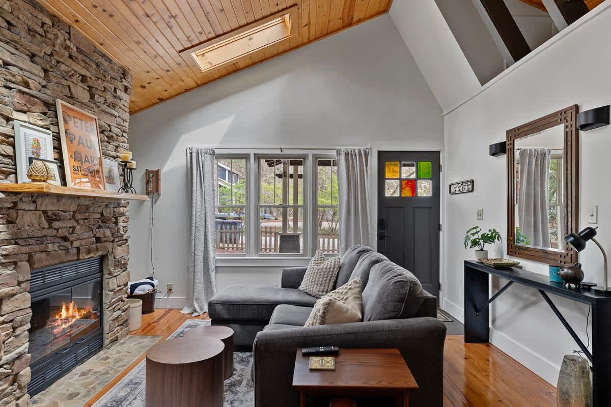 Vaulted ceilings, skylights and a fabulous fireplace. Isn't life grand?