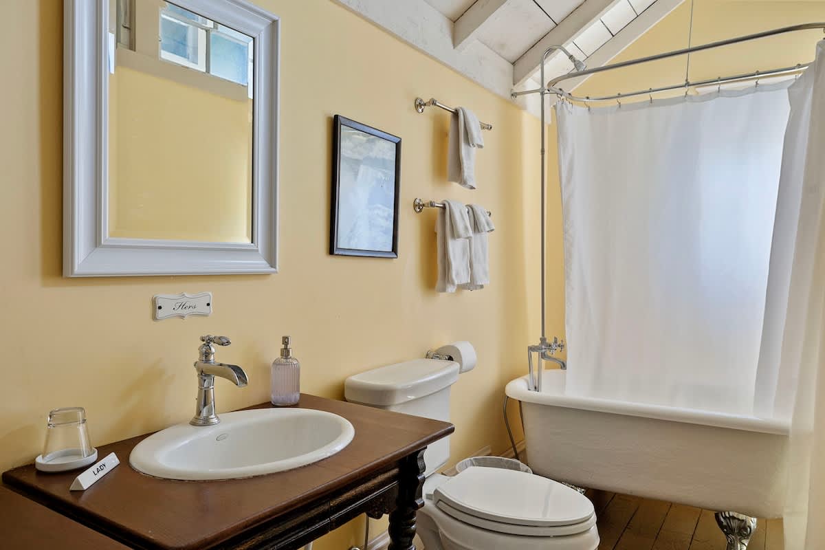 Step into serenity. Unwind in this charming vintage bathroom retreat!