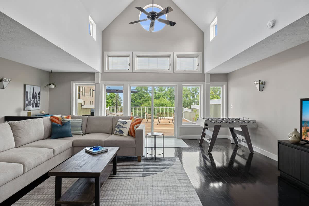 With ample seating, stunning views, and a foosball table for fun, it's the perfect spot to unwind and entertain. Who's ready to lounge in style?