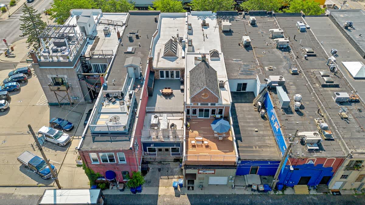 High above the hustle and bustle, admiring the architecture and energy of this lively location.