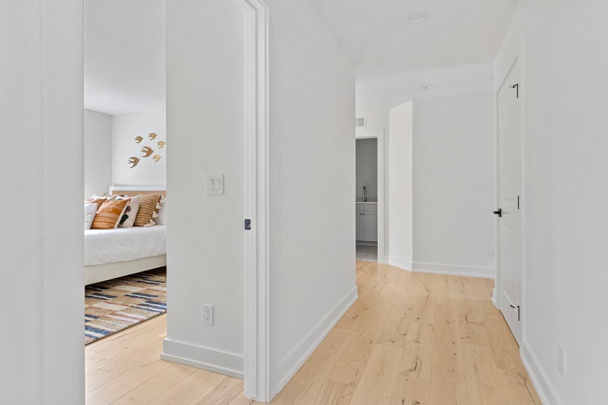 Accessibility meets elegance in this expansive hallway.