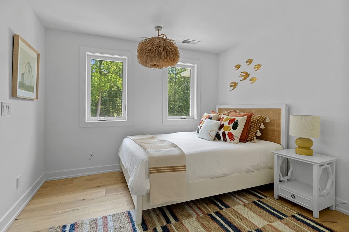 Bedroom 4 is on the main level & has a queen-size bed.