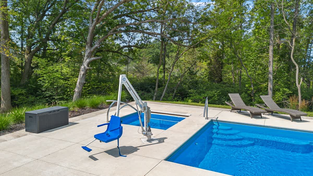 Enjoy the excitement of making a splash right in your own backyard! Another accessible feature for the pool area is the lift by the tub and the pool.