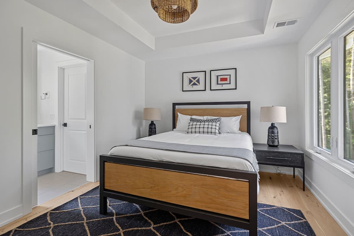 Bedroom 5 is on the main level & has a queen-size bed.