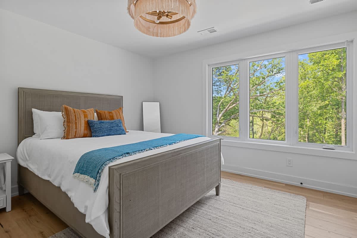 Bedroom 3 is on the main level & has a queen-size bed.